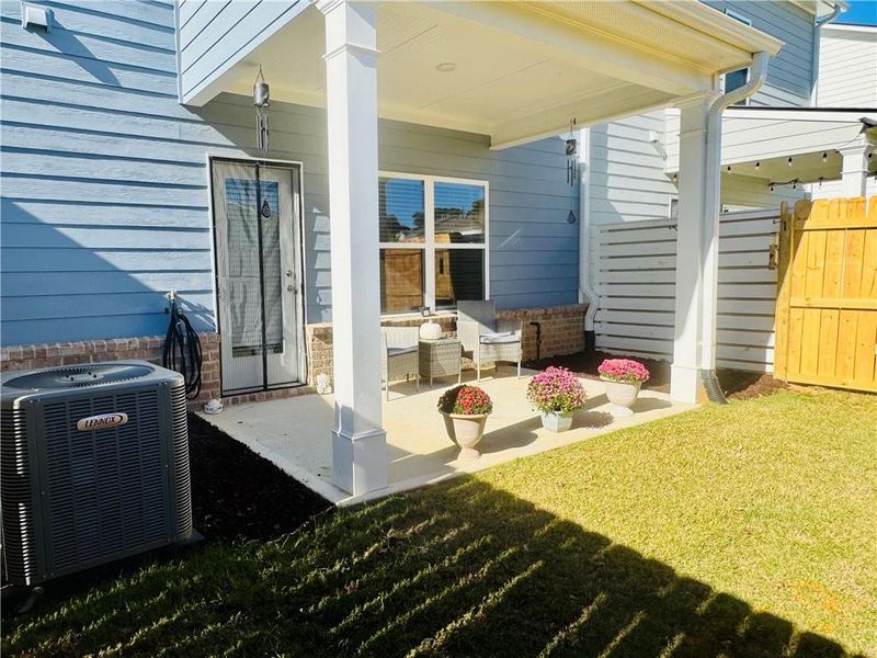Exterior details and patio area of a home in Ellison Square, Sugar Hill (Image 27).