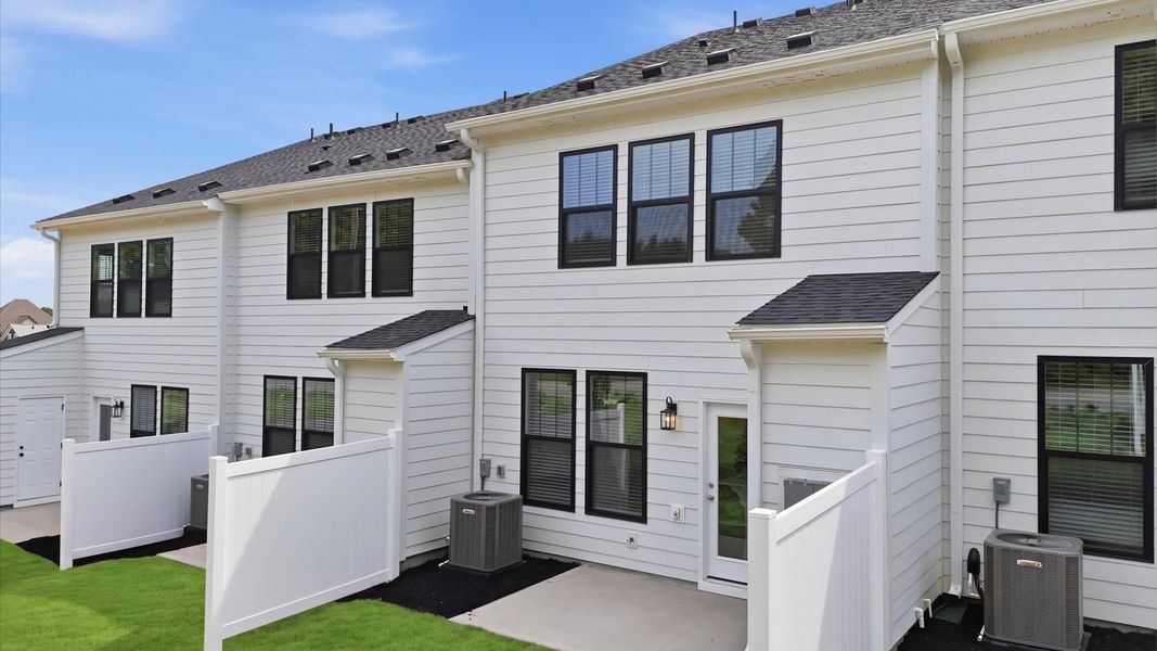 Exterior details and patio area of a home in Gresham Station, Simpsonville (Image 22).