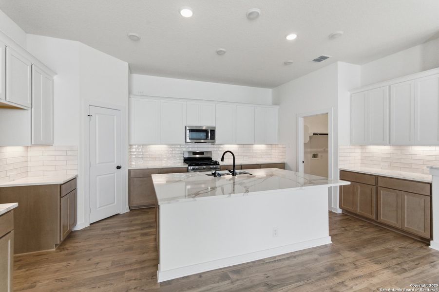 Furnished interior view inside a new home in The Crossvine – Garden Homes, Schertz (Image 10).