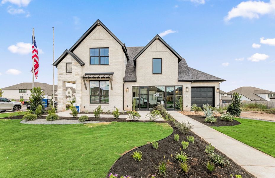 Representative exterior photo of a completed home built from the Garwood by Pulte Homes in Crescent Bluff, Georgetown, TX (Image 16).