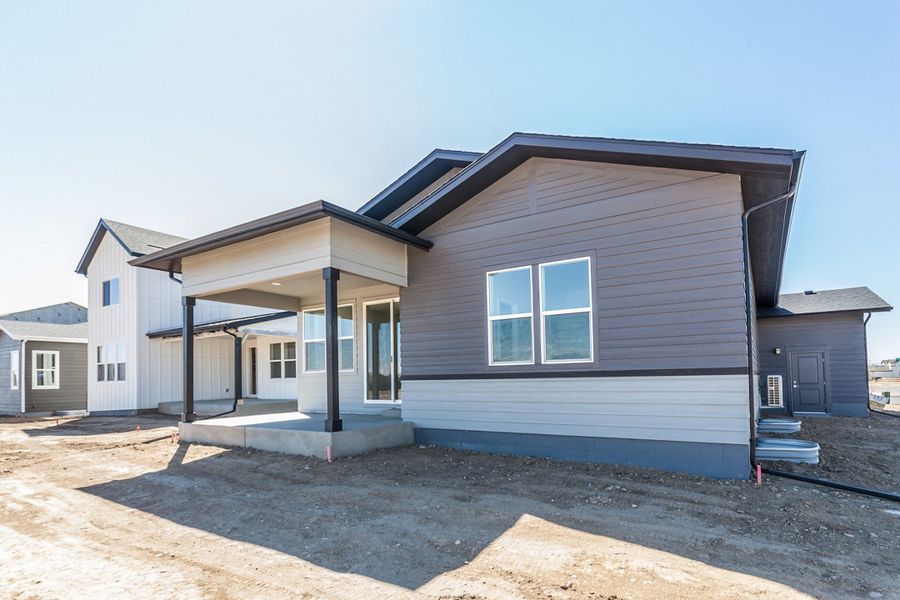 Exterior details and patio area of a home in Prairie Song, Windsor (Image 4).