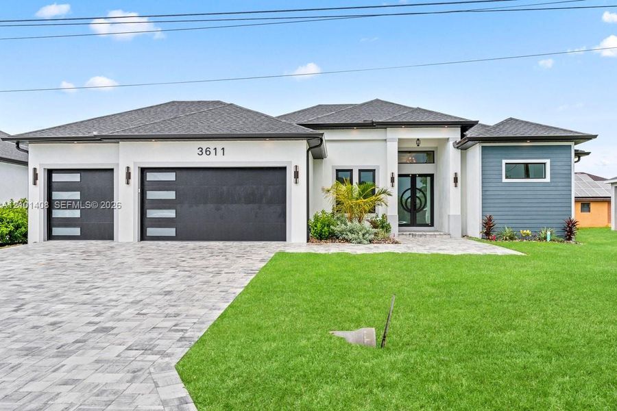 Front exterior of a new home in , Cape Coral, FL, highlighting curb appeal (Image 29).
