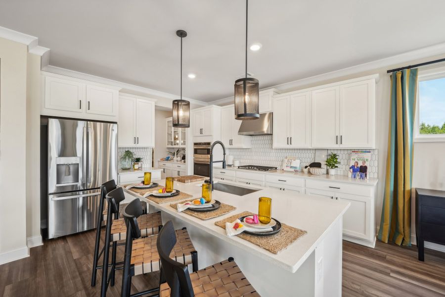 Representative furnished interior of a home built from the Essex by Taylor Morrison in Bennett Farm, Loganville (Image 3).