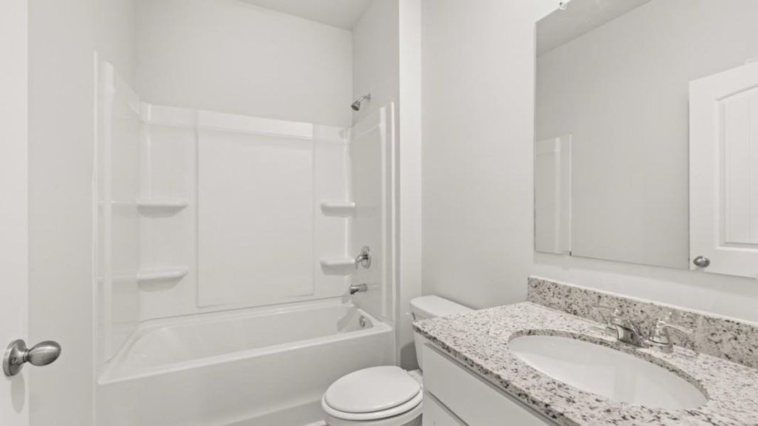 Furnished interior view inside a new home in Oaks at Cedar Grove, Fairburn (Image 9).