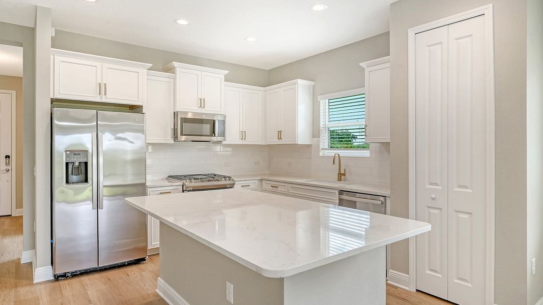 Furnished interior view inside a new home in Wildleaf Real Estate and Homes for Sale in Parrish, FL - Neal Communities, Parrish (Image 8).