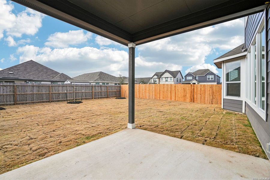 Exterior details and patio area of a home in Estancia Ranch - Classic Series, San Antonio (Image 23).