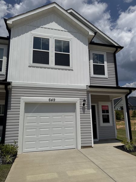 Front exterior of a new home in Windsor, North Augusta, SC, highlighting curb appeal (Image 25). Front exterior of a new home in Windsor, North Augusta, SC, highlighting curb appeal (Image 25).