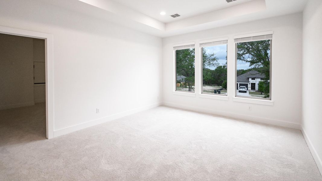 Spacious, unfurnished interior of a new home in 6 Creeks, Kyle (Image 18).