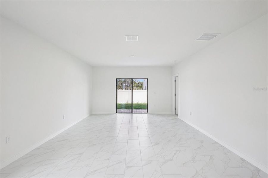 Spacious, unfurnished interior of a new home in Grasslands West, Lakeland (Image 14).