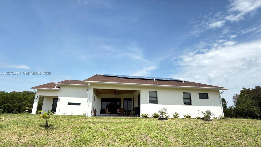 Exterior details and patio area of a home in , Loxahatchee (Image 3).