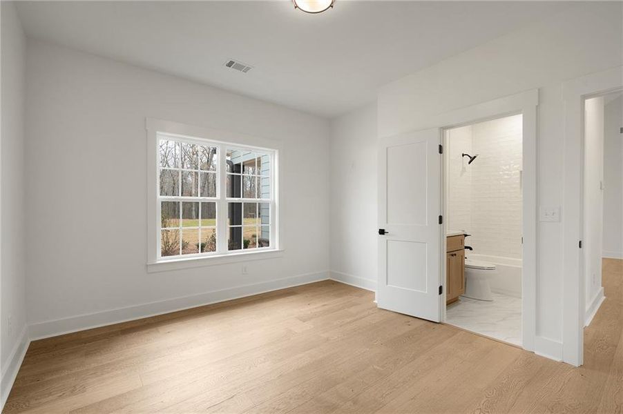 Spacious, unfurnished interior of a new home in , White (Image 33).