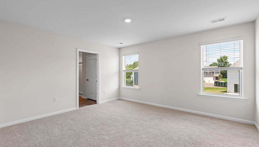 Representative unfurnished interior of a home built from the ELSTON by D.R. Horton in Harrier Point, Woodruff (Image 25).