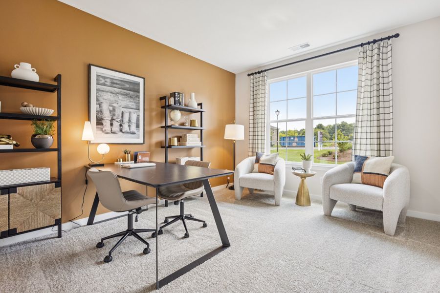 A room with a table chairs and a window. A room with a table chairs and a window.