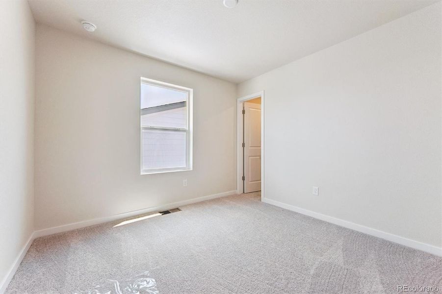 Spacious, unfurnished interior of a new home in Farmlore, Brighton (Image 20).