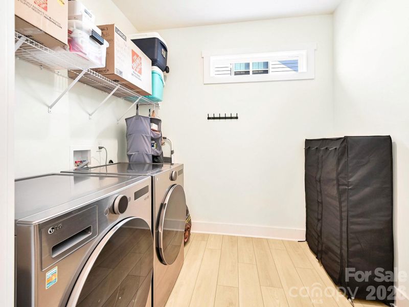 Large main floor laundry room. Washer and Dryer may convey.