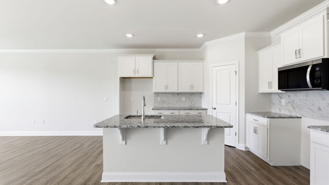 Furnished interior view inside a new home in Townes at Tap Root Farms, Fletcher (Image 5). Furnished interior view inside a new home in Townes at Tap Root Farms, Fletcher (Image 5).