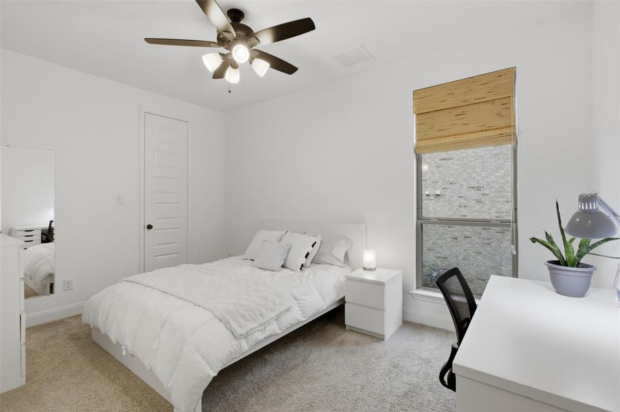 Furnished interior view inside a new home in Wolf Ranch, Georgetown (Image 18).