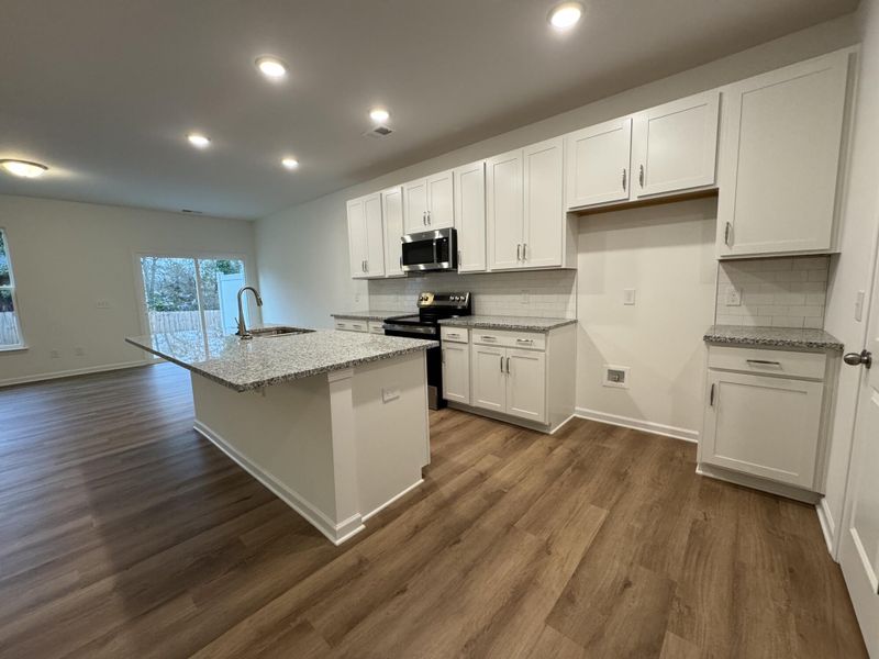 Furnished interior view inside a new home in East Main Townes, Spartanburg (Image 4).
