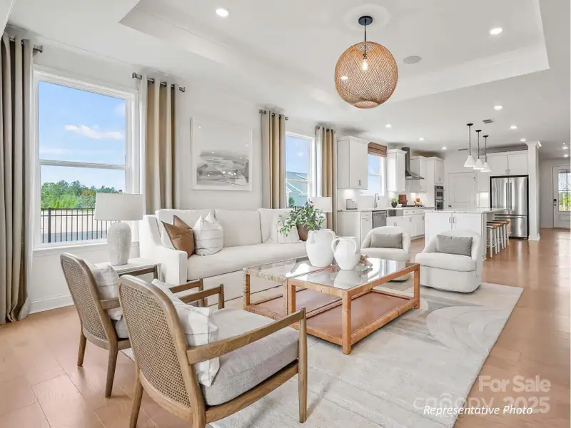 Open-concept kitchen, dining, and living space - perfect for entertaining! Open-concept kitchen, dining, and living space - perfect for entertaining!