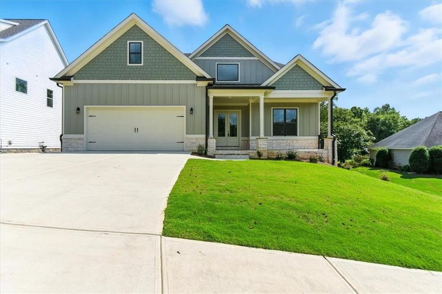 Front exterior of a new home in , Rome, GA, highlighting curb appeal (Image 1). Front exterior of a new home in , Rome, GA, highlighting curb appeal (Image 1).