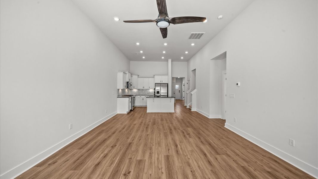 Two-story ceilings and superior scale define this elegant, light-filled family room