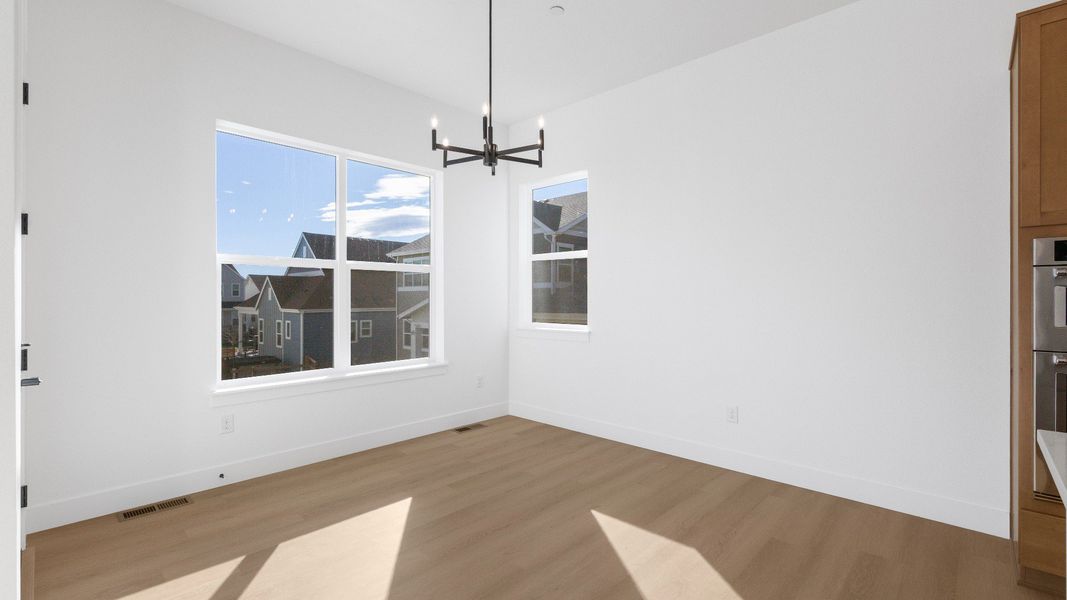 Furnished interior view inside a new home in Dillon Pointe - Journey, Broomfield (Image 18).