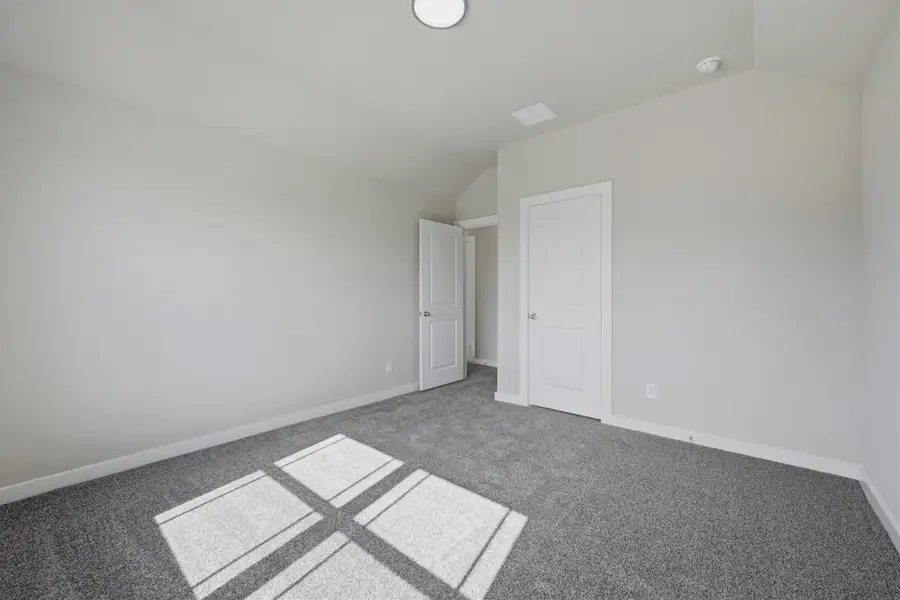 Representative unfurnished interior of a home built from the The Aramis by Lillian Custom Homes in Hickory Hill, Sherman (Image 18). Representative unfurnished interior of a home built from the The Aramis by Lillian Custom Homes in Hickory Hill, Sherman (Image 18).
