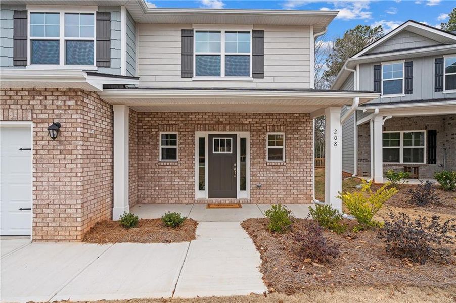 Exterior details and patio area of a home in Canterbury Villas, Carrollton (Image 18).