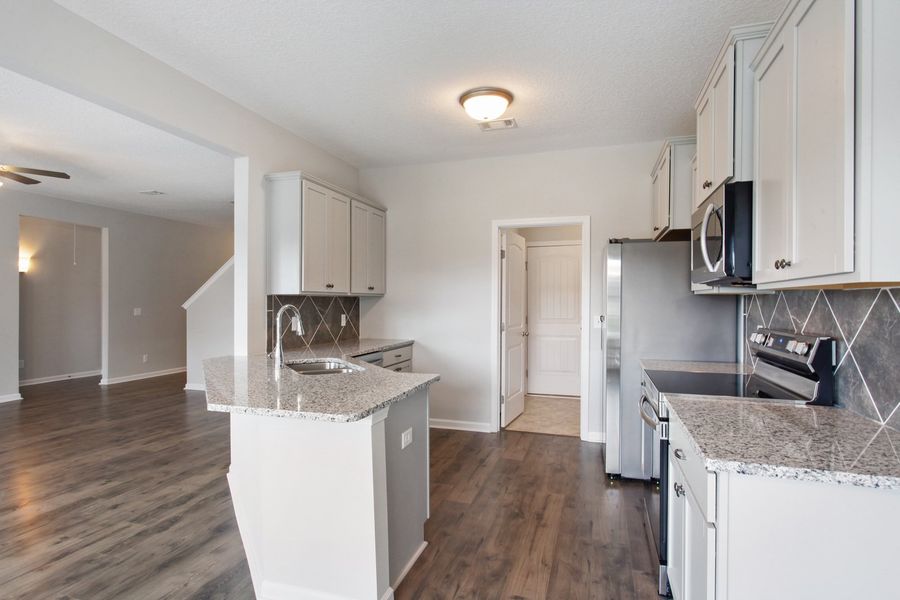 Representative furnished interior of a home built from the The Marne With Bonus by RTS Homes in Grand Reserve, Hinesville (Image 8).
