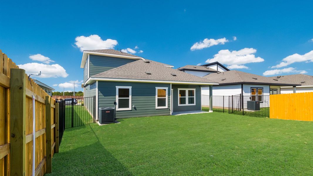Exterior details and patio area of a home in Trails at Wildhorse, Austin (Image 3).