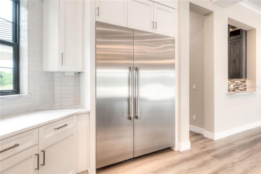 Complete with Thermador appliances.