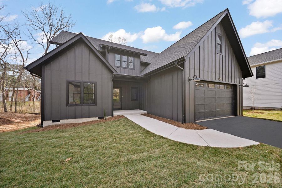 Front exterior of a new home in , Asheville, NC, highlighting curb appeal (Image 1). Front exterior of a new home in , Asheville, NC, highlighting curb appeal (Image 1).