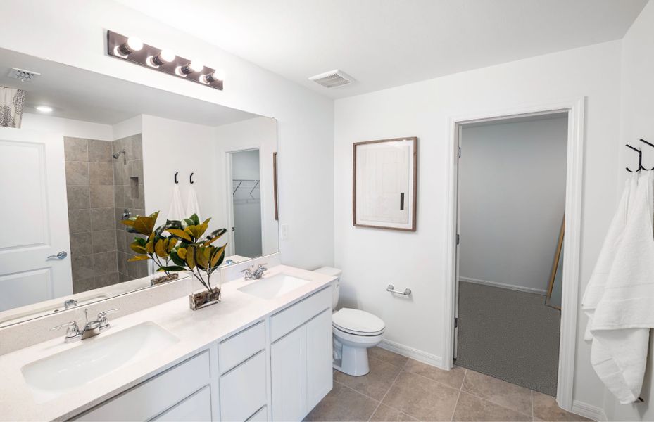 Representative furnished interior of a home built from the McNair by Centex in Whispering Lakes, Lehigh Acres (Image 5).