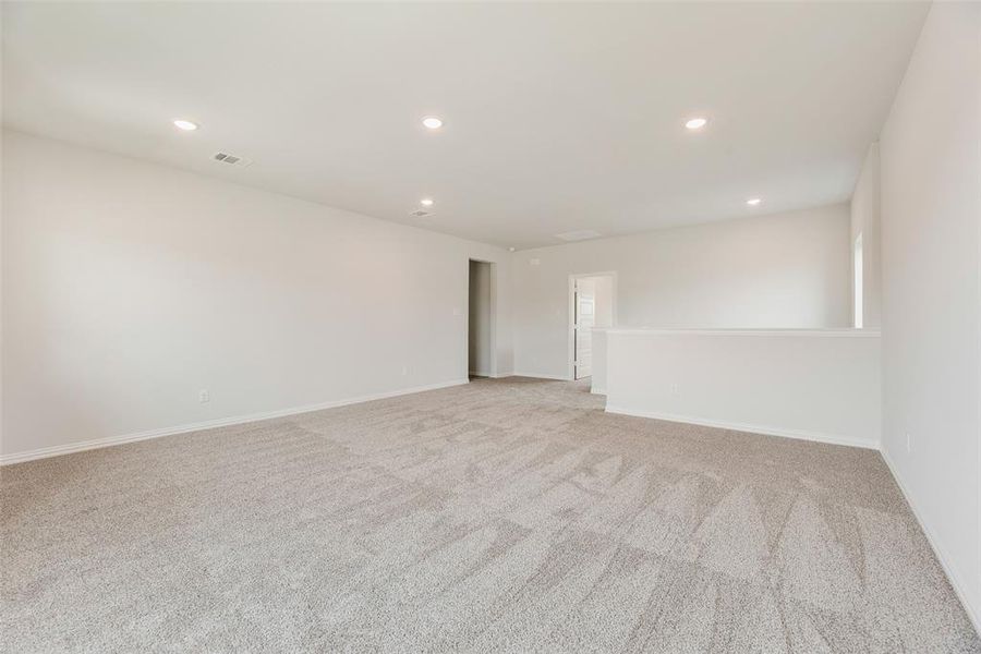 Spacious, unfurnished interior of a new home in Valencia On The Lake, Little Elm (Image 17). Spacious, unfurnished interior of a new home in Valencia On The Lake, Little Elm (Image 17).