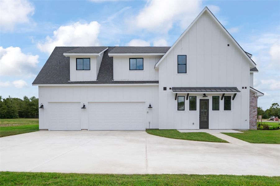 Front exterior of a new home in , Montgomery, TX, highlighting curb appeal (Image 27).