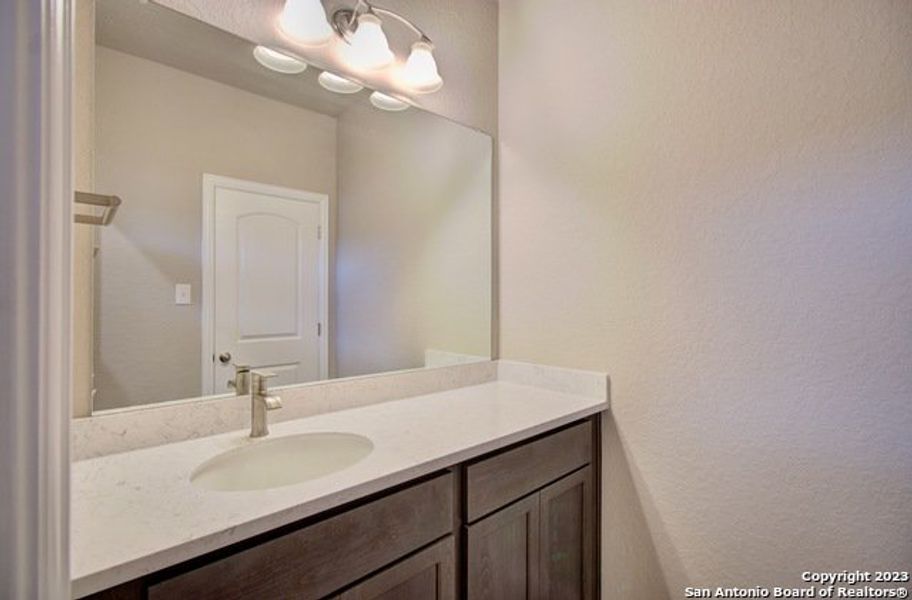 Furnished interior view inside a new home in Stream Waters, Seguin (Image 4).