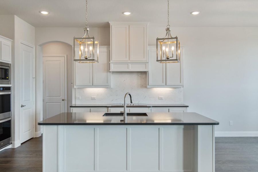 Kitchen | Concept 2406 at The Meadows in Gunter, TX by Landsea Homes