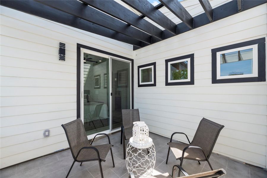 Exterior details and patio area of a home in , Houston (Image 3).