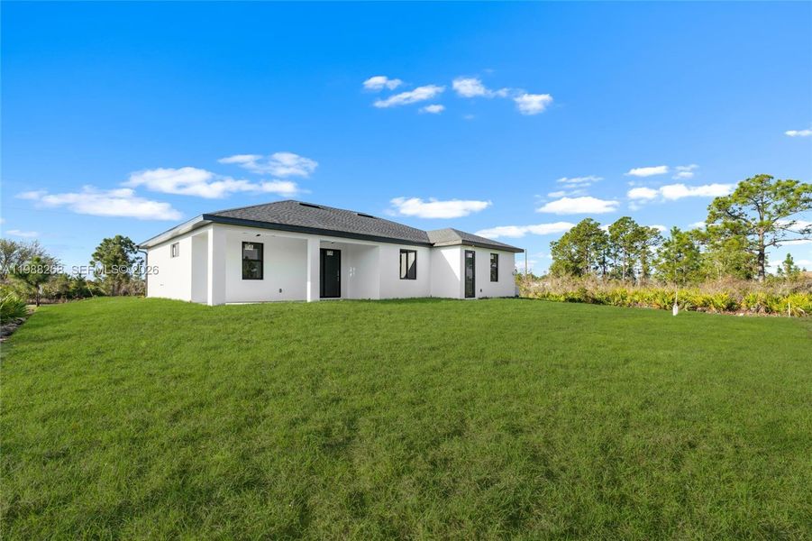 Exterior details and patio area of a home in , Lehigh Acres (Image 22).