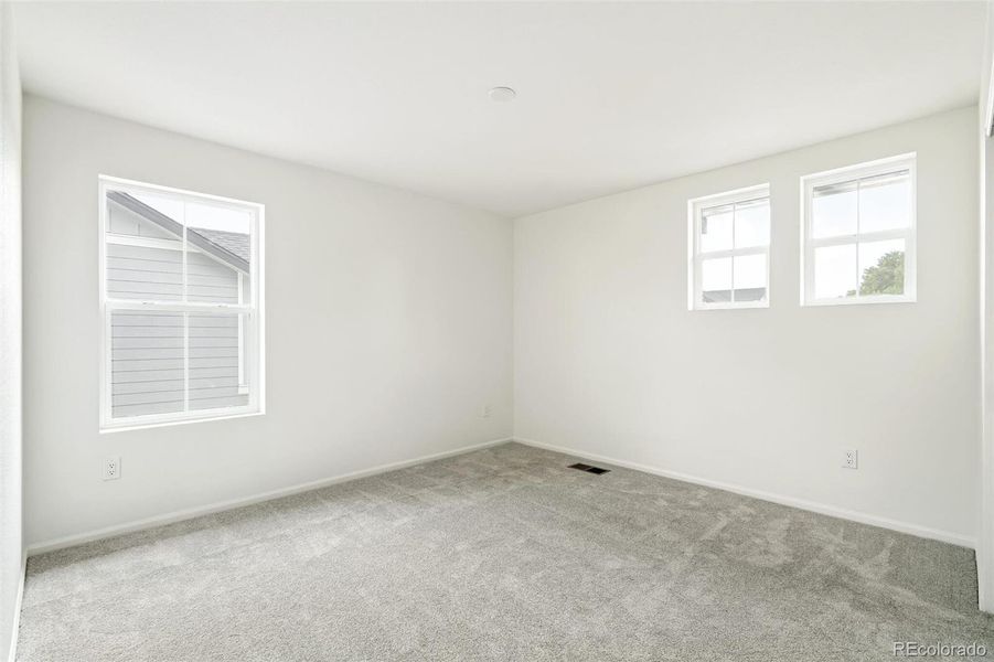 Spacious, unfurnished interior of a new home in Windsong, Thornton (Image 12).