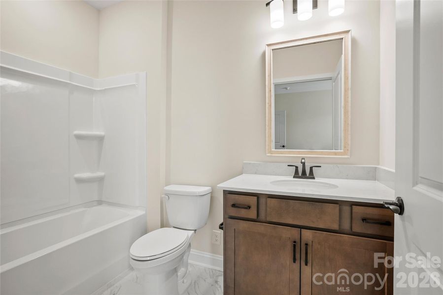 Furnished interior view inside a new home in Carolina Riverside, Belmont (Image 17).