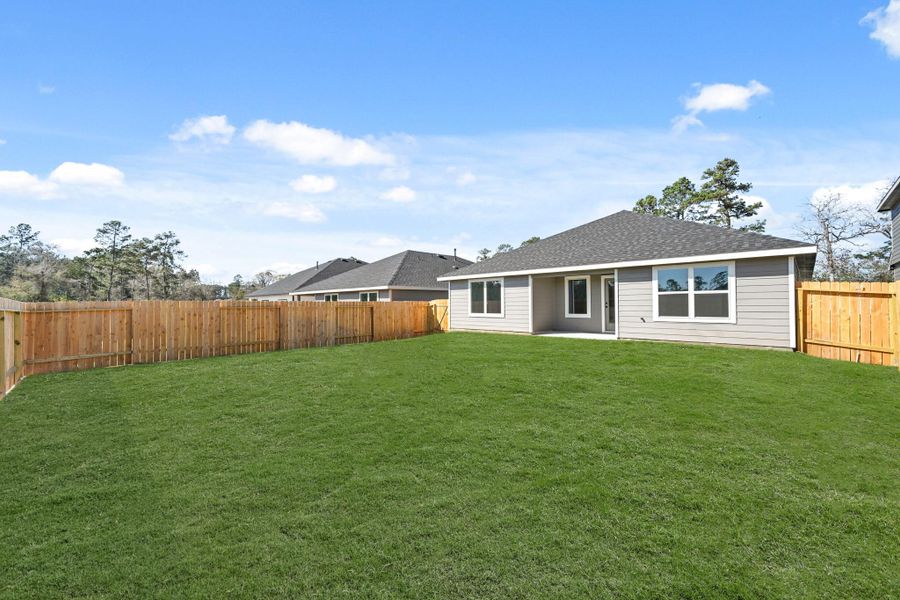 Exterior details and patio area of a home in Chapel Lakes, Montgomery (Image 22).