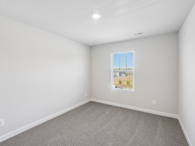 Turn the secondary bedroom into a quaint guest room.