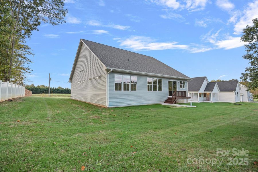 Exterior details and patio area of a home in , Harmony (Image 25).