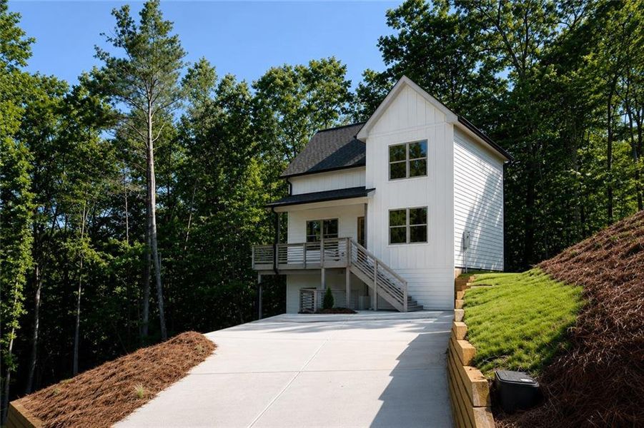 Front exterior of a new home in , Gainesville, GA, highlighting curb appeal (Image 23). Front exterior of a new home in , Gainesville, GA, highlighting curb appeal (Image 23).
