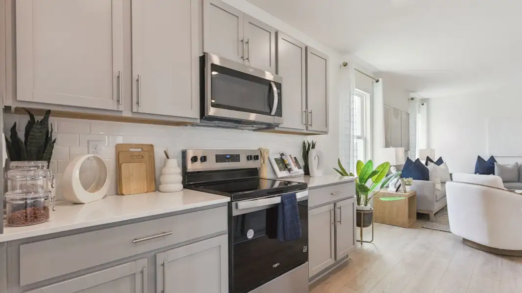 Furnished interior view inside a new home in Crossroads at Kelly Park, Apopka (Image 11).