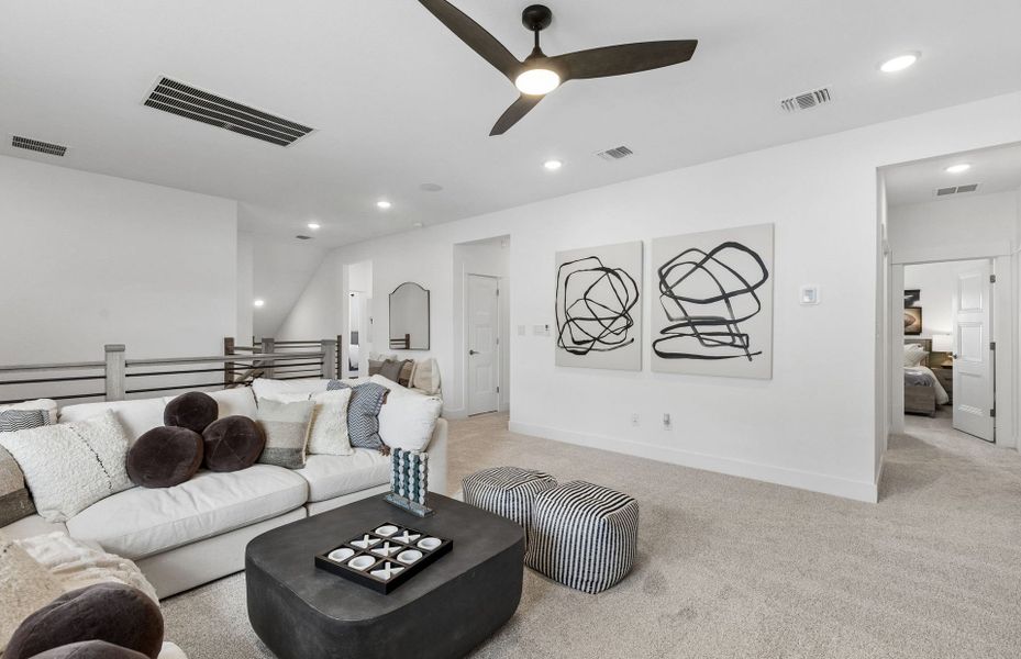 Representative furnished interior of a home built from the Iredell by Pulte Homes in Katy Court, Katy (Image 52).