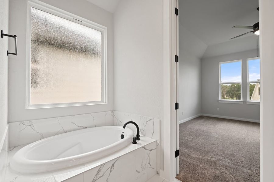 Furnished interior view inside a new home in Terrace Collection at Lariat, Liberty Hill (Image 14). Furnished interior view inside a new home in Terrace Collection at Lariat, Liberty Hill (Image 14).