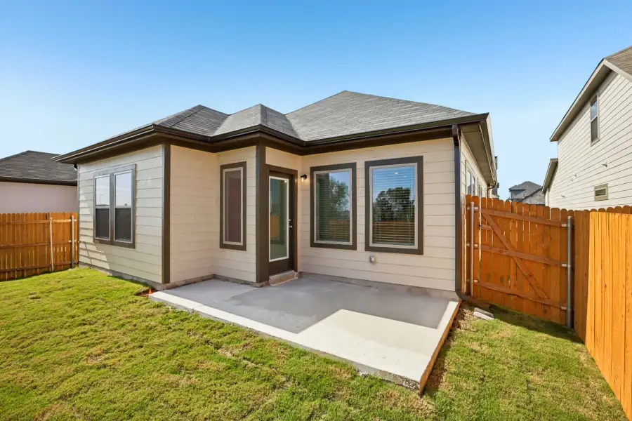 Exterior details and patio area of a home in Trinity Ranch, Elgin (Image 4).