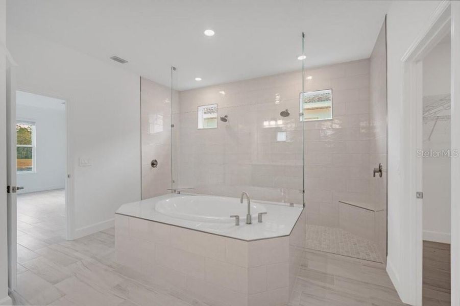 Furnished interior view inside a new home in Harvest at Ovation, Winter Garden (Image 16).